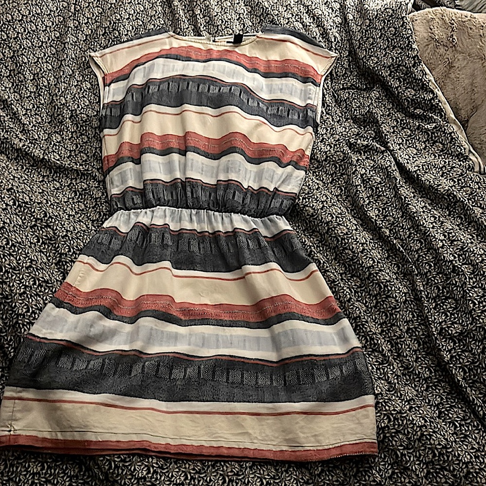 I’m selling this beautiful red, white, and blue mini dress.